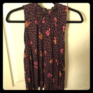 Sleeveless mock neck top